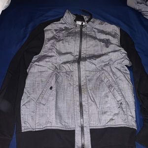 Black/ Grey Calvin Klein hoodie very warm and lightweight used twice doesn’t fit